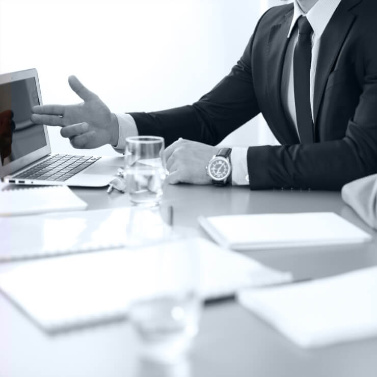 Man pointing at laptop